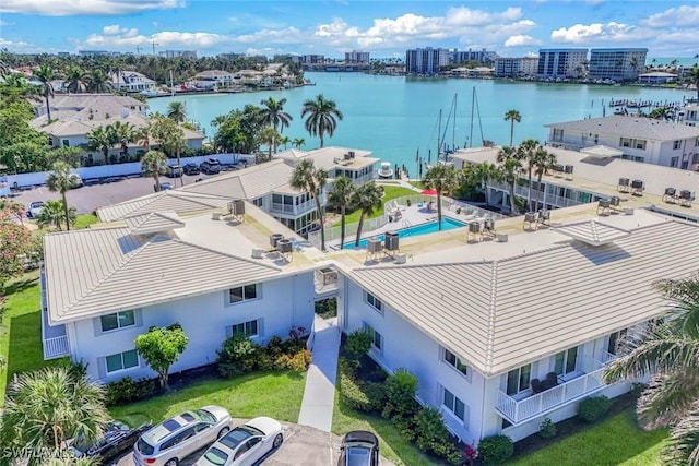 bird's eye view with a water view and a city view