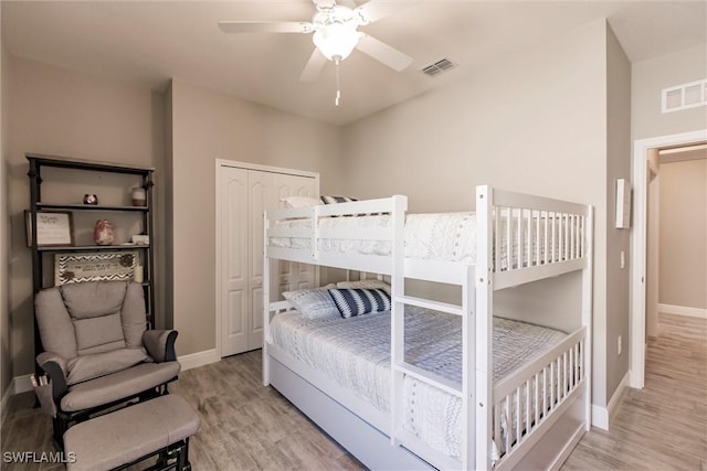 bedroom with visible vents, baseboards, and light wood-style flooring