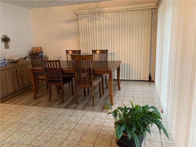 dining room with light tile patterned floors