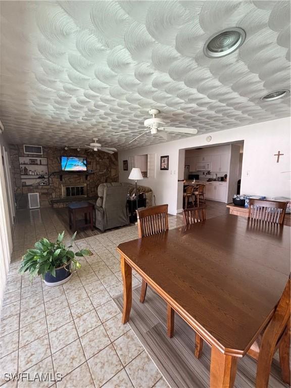 dining area with ceiling fan