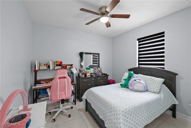 bedroom with light tile patterned floors and a ceiling fan