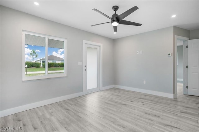 unfurnished room with recessed lighting, a ceiling fan, baseboards, and light wood-type flooring