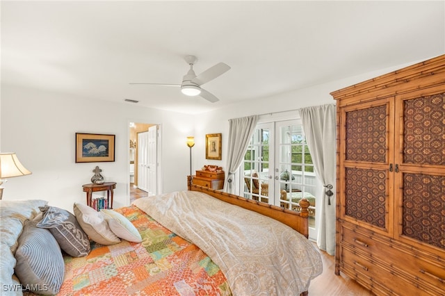bedroom with access to exterior, ceiling fan, and visible vents