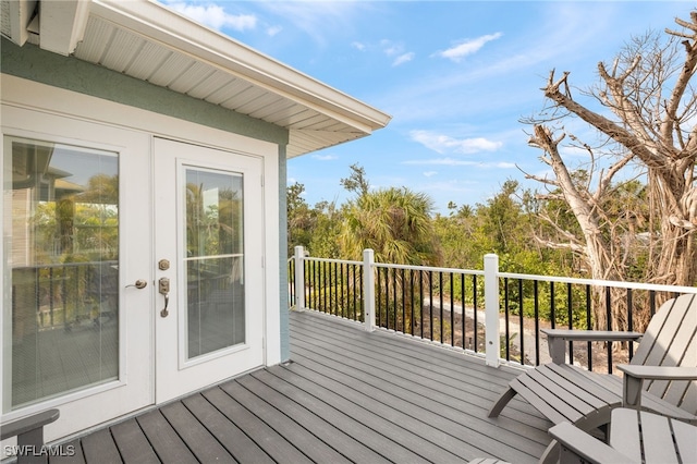 wooden terrace featuring french doors