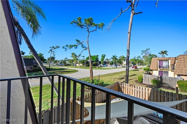 balcony featuring a residential view