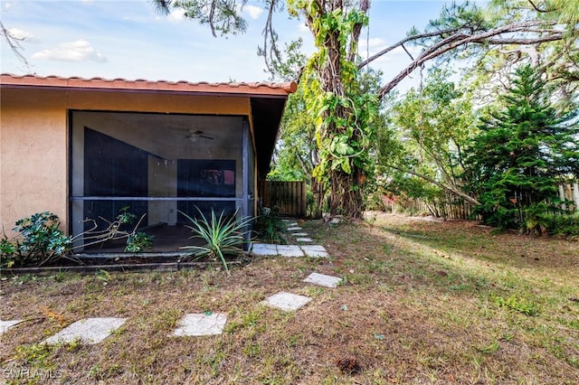 26955 Croise Dr, Bonita Springs, FL 34135 - view of yard featuring fence and a sunroom