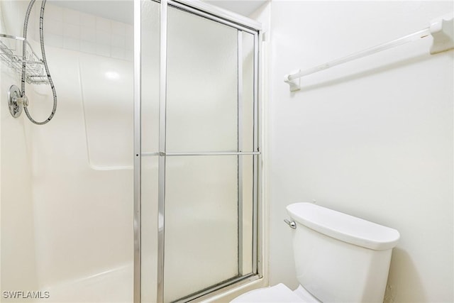 26955 Croise Dr, Bonita Springs, FL 34135 - bathroom featuring toilet and a stall shower