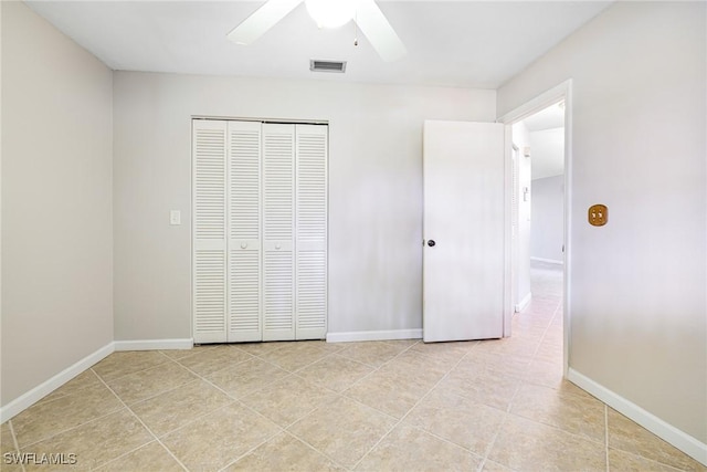 26955 Croise Dr, Bonita Springs, FL 34135 - unfurnished bedroom with a closet, light tile patterned floors, baseboards, and visible vents