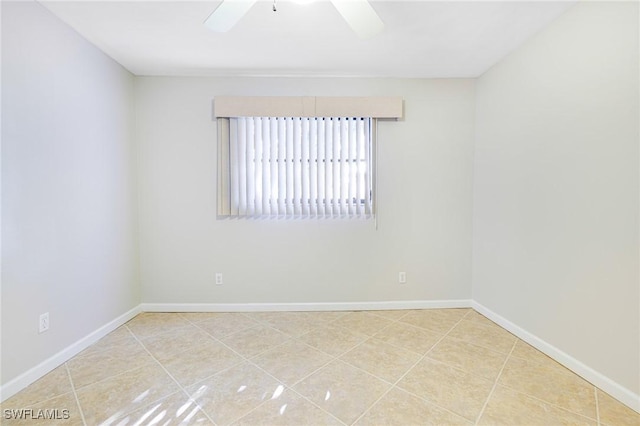 26955 Croise Dr, Bonita Springs, FL 34135 - tiled empty room featuring baseboards and a ceiling fan