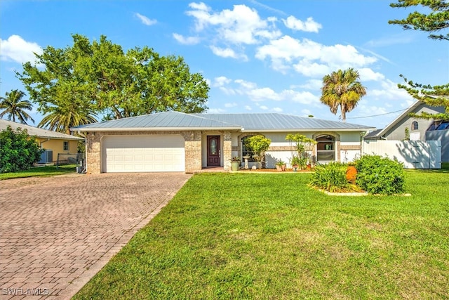 2215 Club House Rd, North Fort Myers, FL 33917 - ranch-style house featuring fence, a front yard, metal roof, decorative driveway, and an attached garage