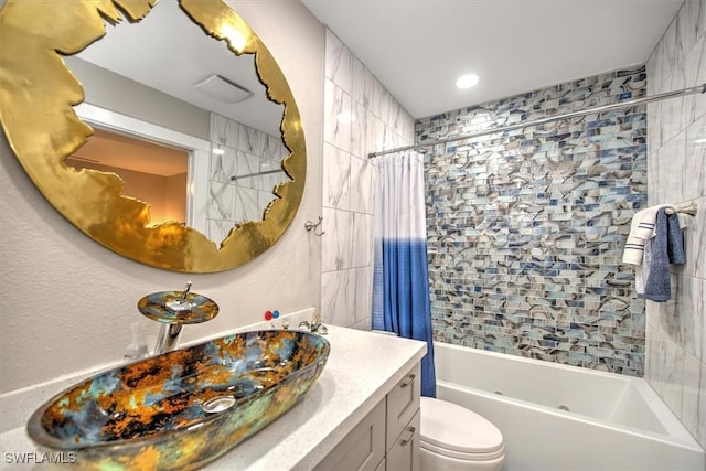2215 Club House Rd, North Fort Myers, FL 33917 - full bath featuring toilet, vanity, and shower / bath combination with curtain