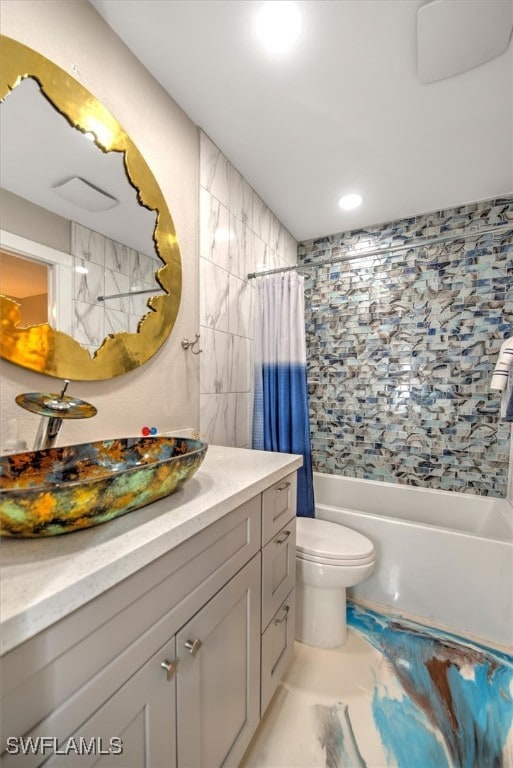 2215 Club House Rd, North Fort Myers, FL 33917 - full bath featuring vanity, toilet, and shower / bath combo