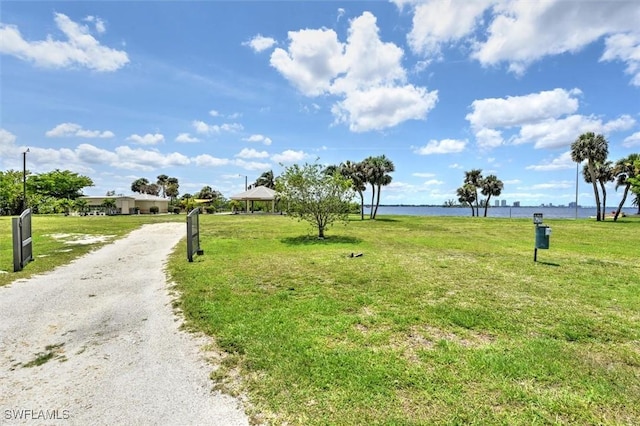 2215 Club House Rd, North Fort Myers, FL 33917 - view of home's community with a gazebo, a yard, a water view, and driveway