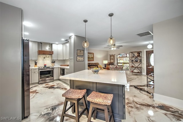 2215 Club House Rd, North Fort Myers, FL 33917 - kitchen with visible vents, marble finish floor, open floor plan, stainless steel range with electric cooktop, and wall chimney range hood