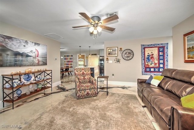 2215 Club House Rd, North Fort Myers, FL 33917 - living area featuring visible vents, baseboards, and a ceiling fan