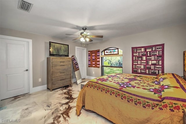 2215 Club House Rd, North Fort Myers, FL 33917 - bedroom featuring visible vents, marble finish floor, a ceiling fan, and baseboards