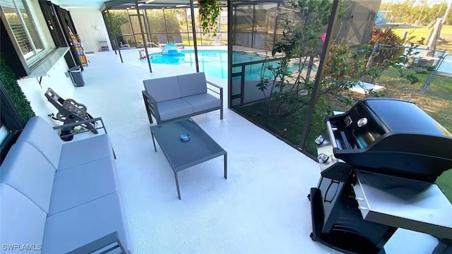 view of patio with an outdoor pool, glass enclosure, and area for grilling