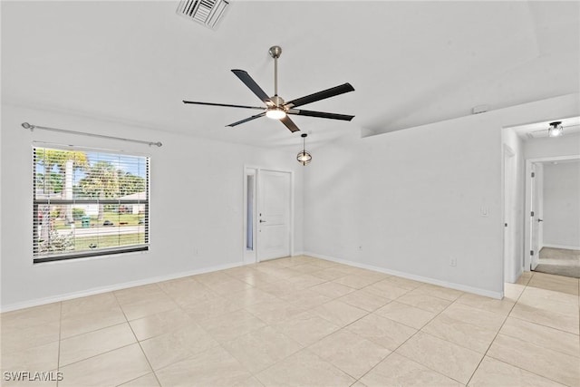 3734 SE 3rd Pl, Cape Coral, FL 33904 - spare room with light tile patterned floors, visible vents, vaulted ceiling, and ceiling fan