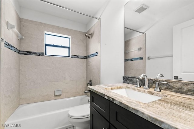 3734 SE 3rd Pl, Cape Coral, FL 33904 - full bathroom with visible vents, toilet, vanity, and shower / washtub combination