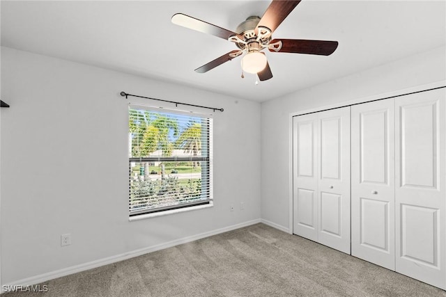 3734 SE 3rd Pl, Cape Coral, FL 33904 - unfurnished bedroom with a closet, ceiling fan, baseboards, and carpet floors