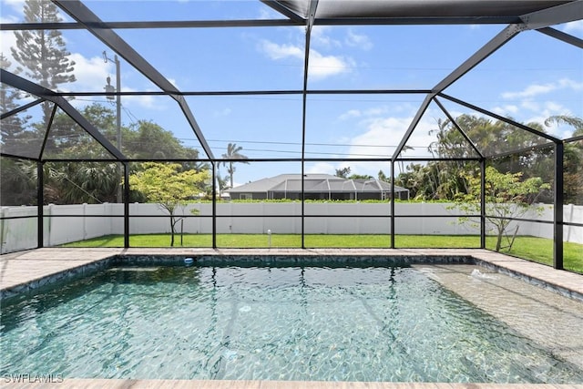 3734 SE 3rd Pl, Cape Coral, FL 33904 - view of swimming pool with a fenced in pool, a fenced backyard, a lanai, and a lawn