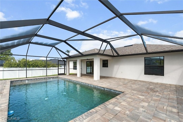 3734 SE 3rd Pl, Cape Coral, FL 33904 - outdoor pool with a ceiling fan, fence, a patio, and a lanai