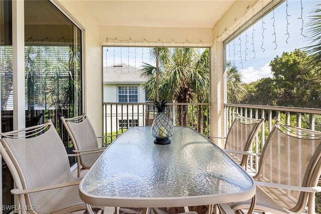 balcony featuring outdoor dining area