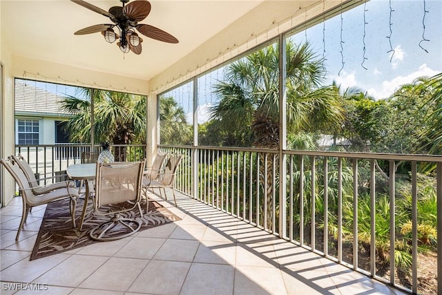sunroom with tile patterned floors