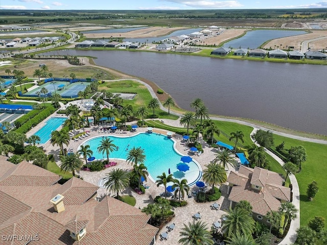 birds eye view of property with a residential view and a water view