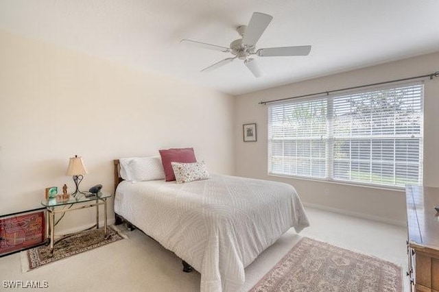 7520 Firenze Ln, Naples, FL 34114 - carpeted bedroom featuring baseboards and ceiling fan