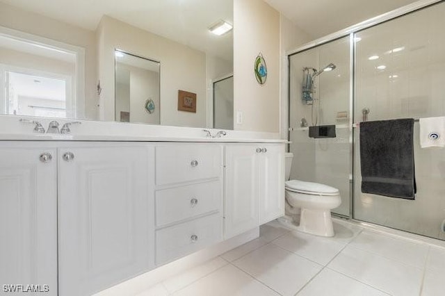 7520 Firenze Ln, Naples, FL 34114 - bathroom featuring tile patterned floors, a sink, a stall shower, and double vanity