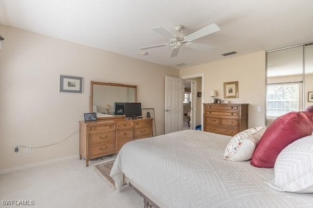 7520 Firenze Ln, Naples, FL 34114 - carpeted bedroom with a ceiling fan, visible vents, and baseboards
