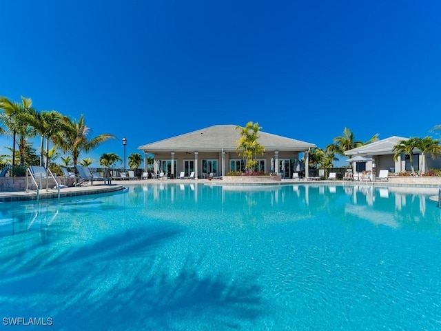 community pool featuring a patio area
