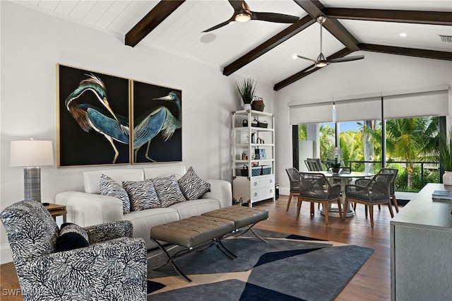 living room featuring wood finished floors, lofted ceiling with beams, and ceiling fan