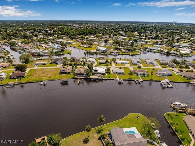 aerial view featuring a water view and a residential view