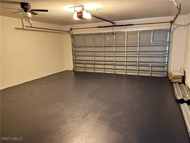 4430 18th Ave NE, Naples, FL 34120 - garage with a ceiling fan and a garage door opener