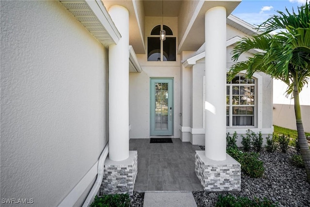 9954 Alabama St, Bonita Springs, FL 34135 - view of exterior entry featuring stucco siding