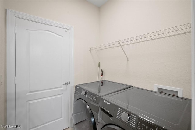 9954 Alabama St, Bonita Springs, FL 34135 - laundry area featuring laundry area and separate washer and dryer