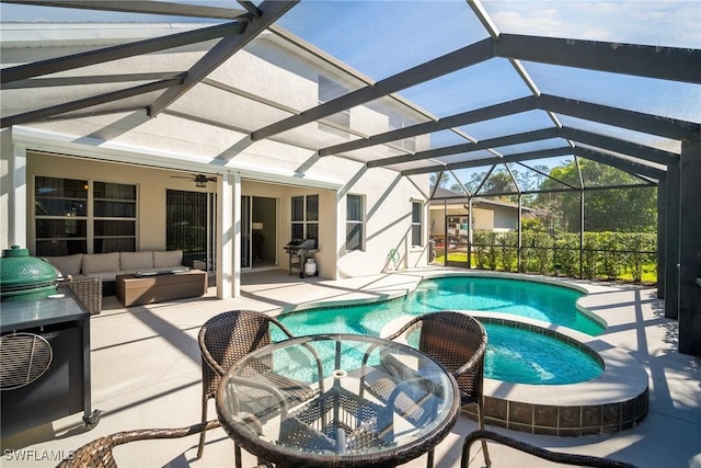 9954 Alabama St, Bonita Springs, FL 34135 - view of pool with a pool with connected hot tub, a lanai, an outdoor hangout area, a grill, and a patio