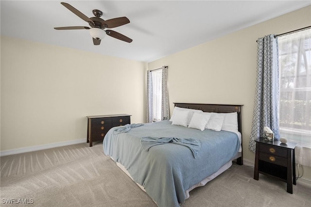 9954 Alabama St, Bonita Springs, FL 34135 - bedroom with multiple windows, carpet flooring, baseboards, and ceiling fan