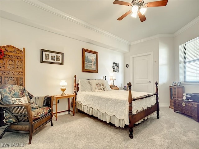 bedroom featuring light carpet, a ceiling fan, baseboards, and ornamental molding