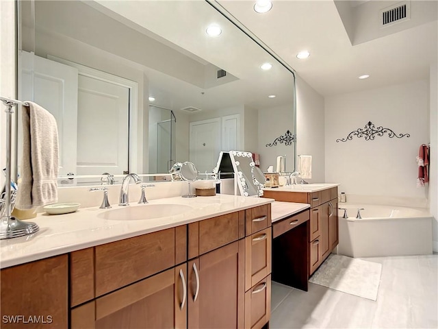 bathroom with vanity, visible vents, recessed lighting, a shower stall, and a garden tub