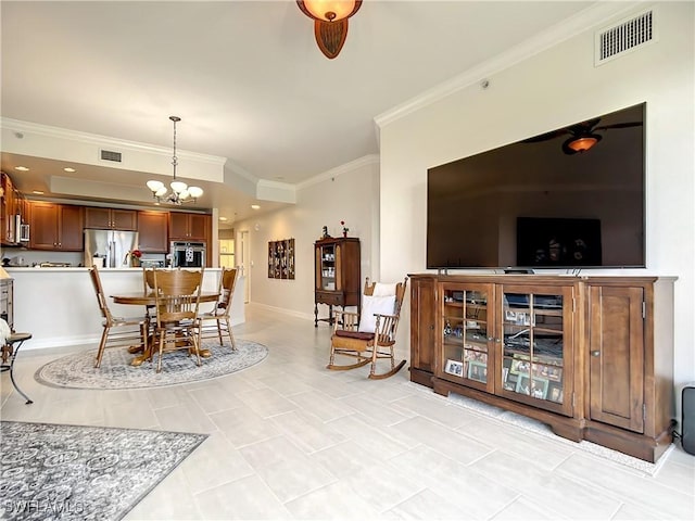 dining space with baseboards, visible vents, and ornamental molding