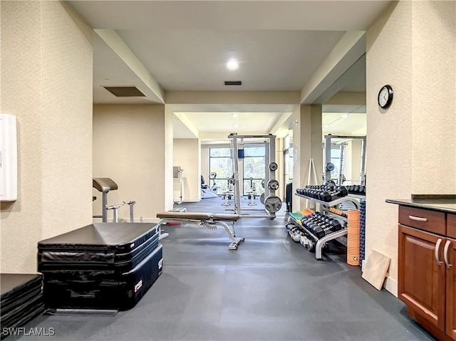 workout area featuring visible vents