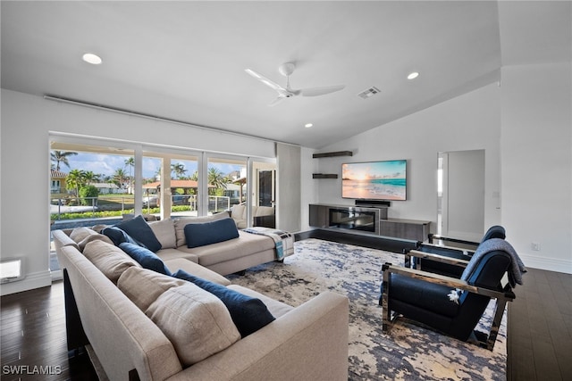 living room with visible vents, recessed lighting, lofted ceiling, ceiling fan, and hardwood / wood-style flooring
