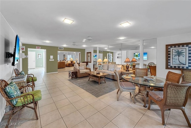 4200 Belair Ln Unit 303, Naples, FL 34103 - living area with light tile patterned floors and visible vents
