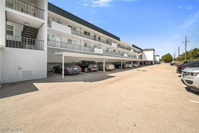 4200 Belair Ln Unit 303, Naples, FL 34103 - view of covered parking lot