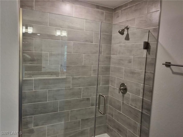 1127 NW 14th Ter, Cape Coral, FL 33993 - bathroom featuring a stall shower