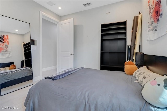 2312 4th Ave SE, Naples, FL 34117 - bedroom with baseboards, visible vents, and recessed lighting