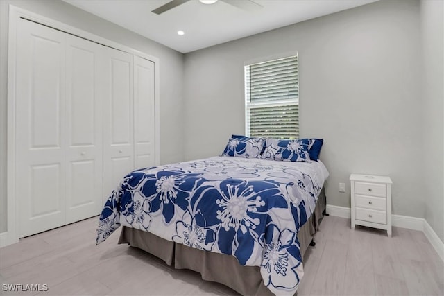 2312 4th Ave SE, Naples, FL 34117 - bedroom featuring a closet, wood finished floors, baseboards, and a ceiling fan